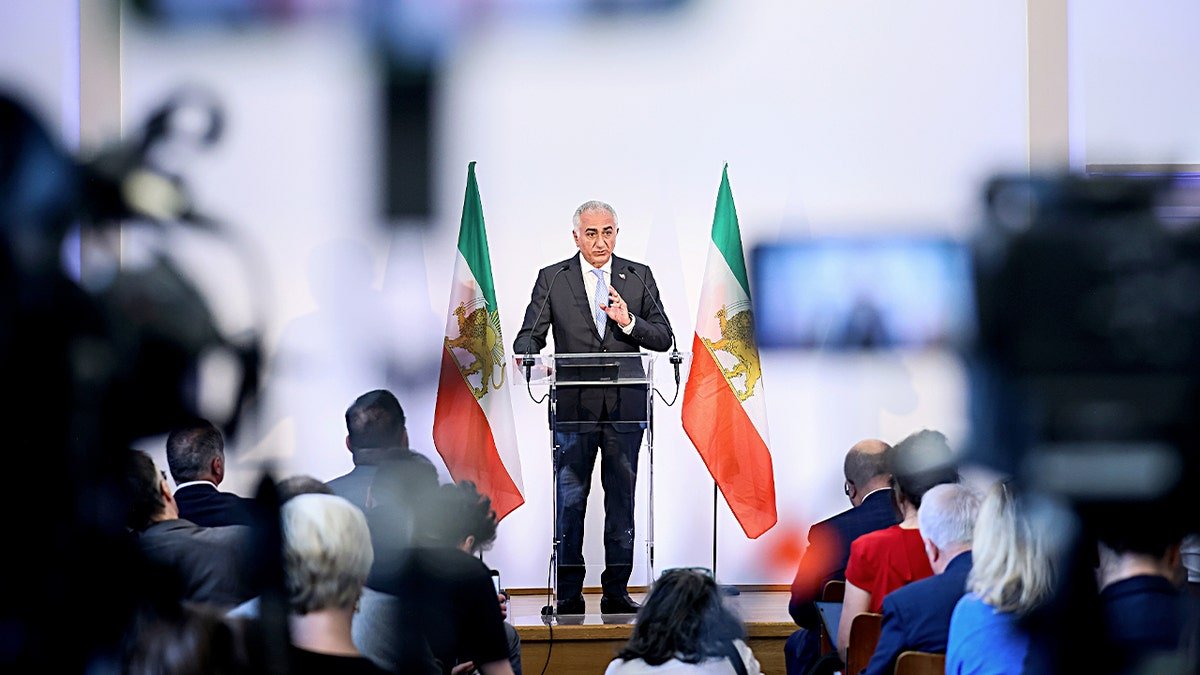 Reza Pahlavi on the stage widely