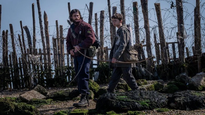 Jimmy and Spike are walking through the barbed wire fence after 28 years