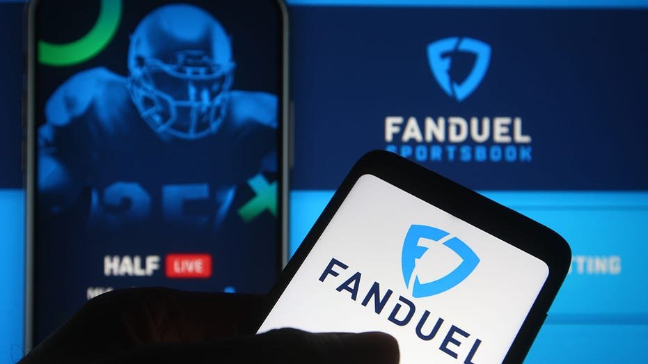 Vanduel logo on the phone and in the background