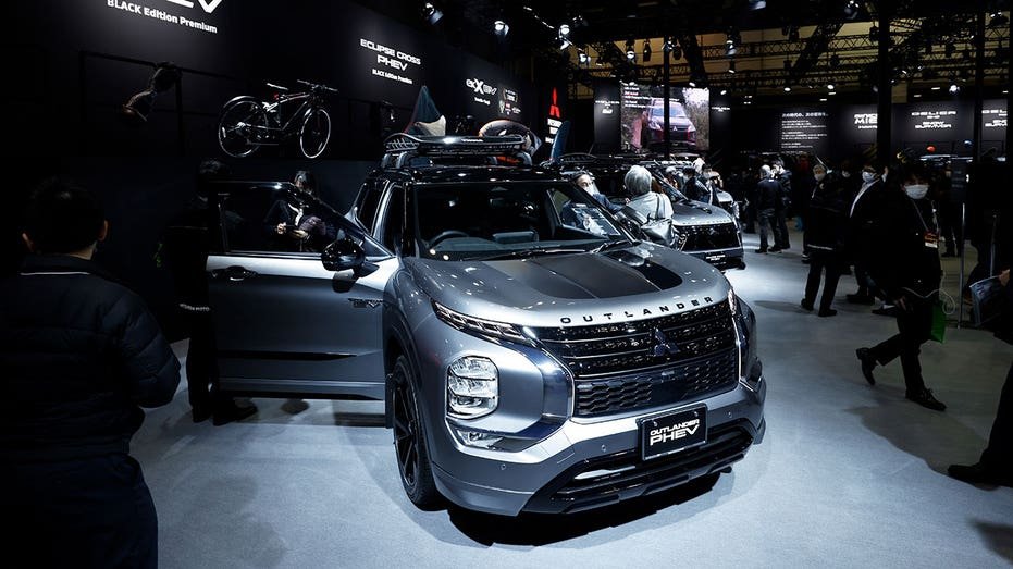 A Mitsubishi Motors Corp. Outlander Hybrid Electric Corper (PHEV) Black Edition Precium OPIUM in Tokyo Auto Salon Salon in Chiba, Japan, on Friday, January 13, 2023.