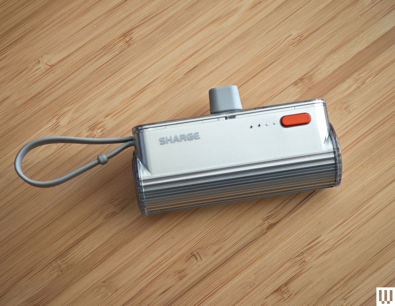 Sharge Flow Mini, a rectangular silver bank.