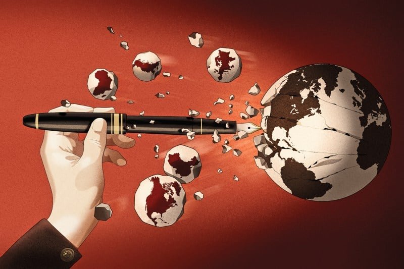 An illustration shows a Nazi-uniformed hand holding a fountain pen that breaks the globe into spheres of influence.