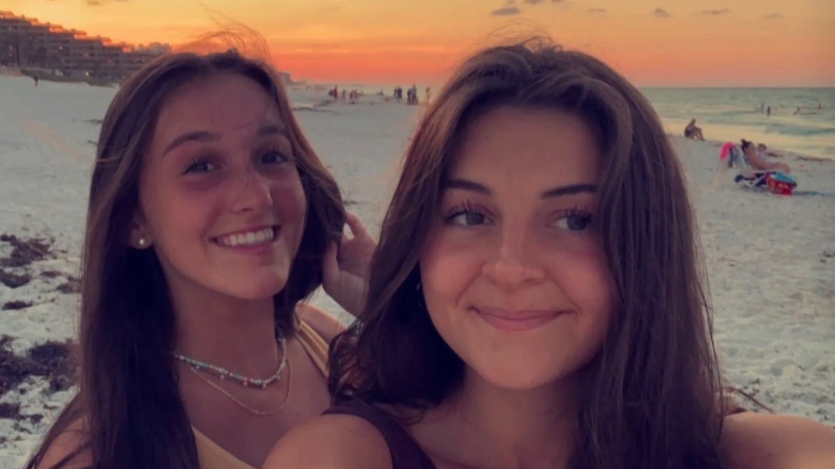 Lauren Phillips, the left, with her sister, Luke Riley