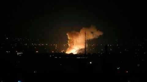 Smoke rises after an explosion in Tehran