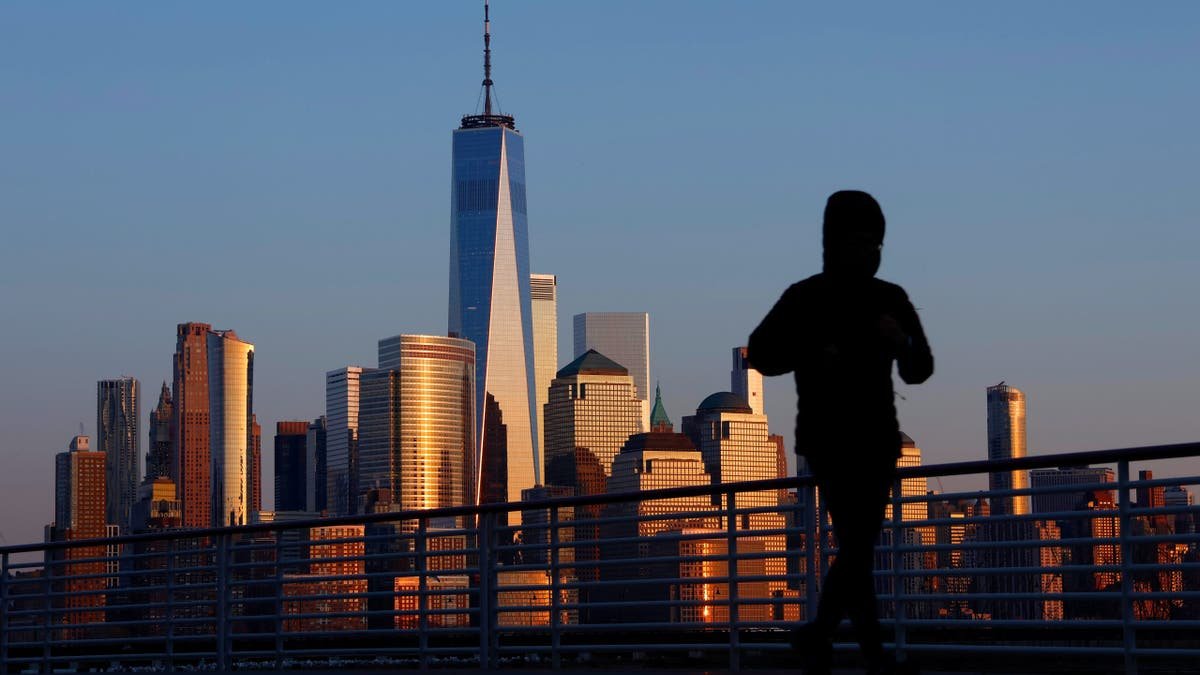 Skyline Nyc with running in the foreground