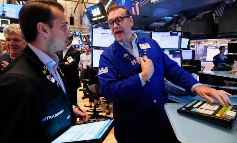 Wall Street gains ground following a solid jobs report and.jpeg