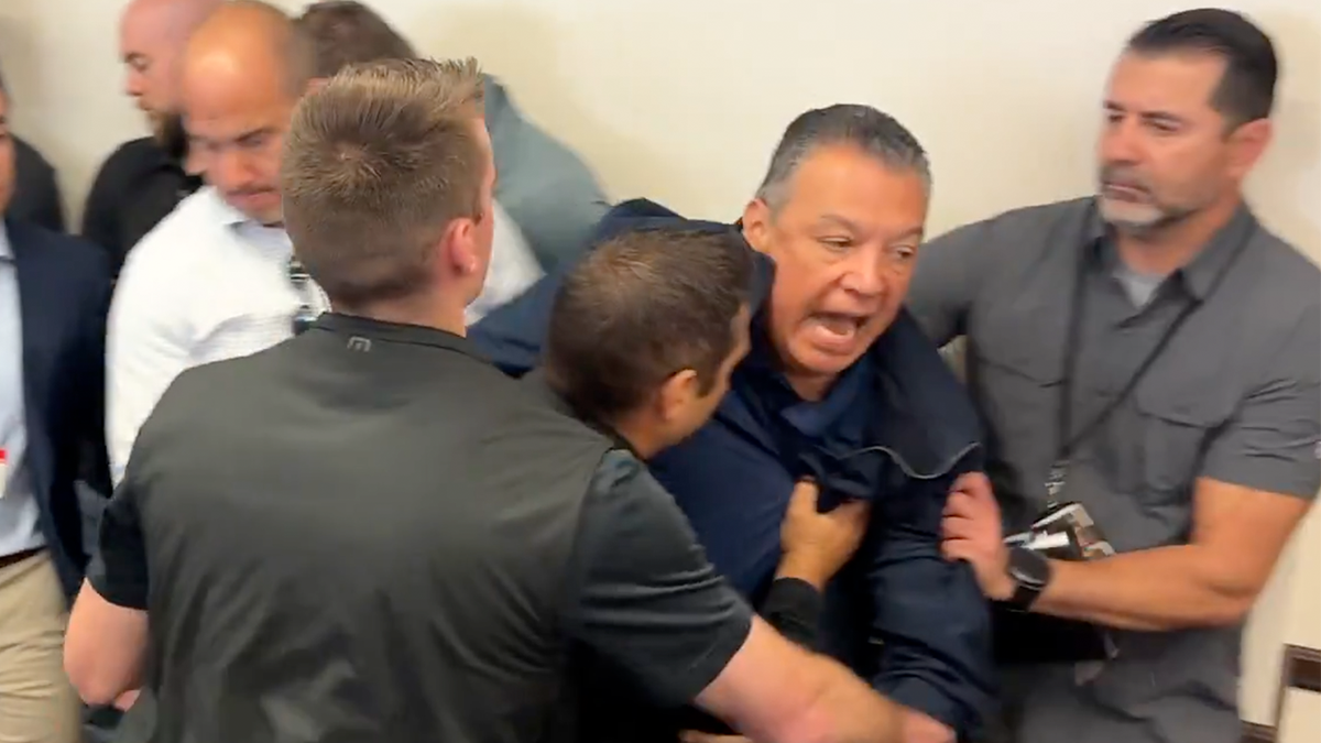 Senator Alex Padilla is temporarily detained after approaching a second. Nayyem platform at the press conference.