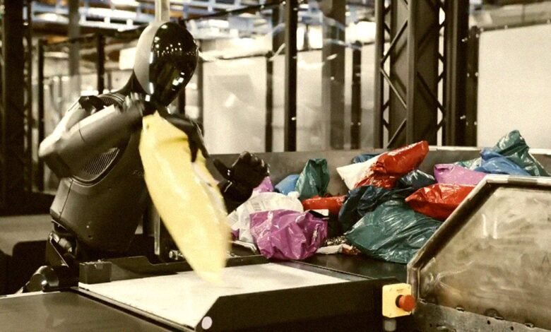 Watching This Humanoid Robot Sort Packages Is Quite Something.jpg