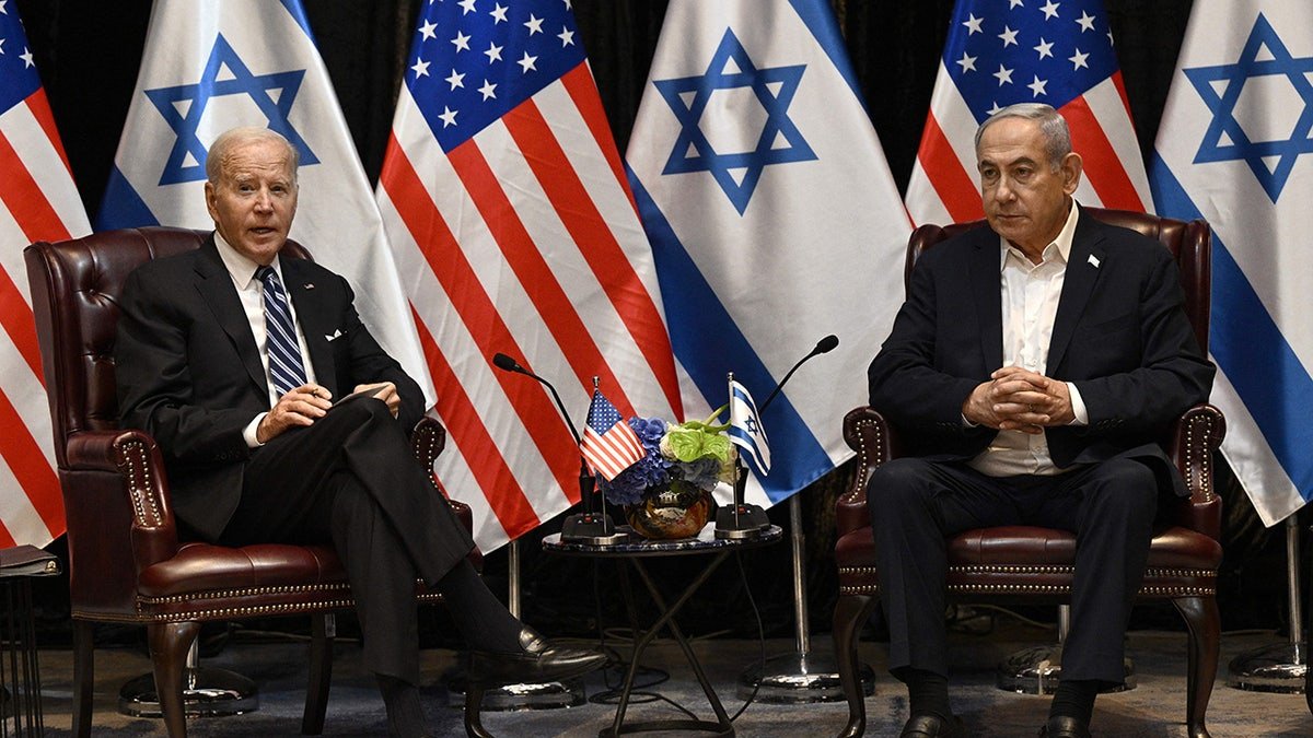 President Joe Biden listens to the left to Israeli Prime Minister Benjamin Netanyahu, joining a cabinet meeting in the Israeli war in Tel Aviv on October 18, 2023, amid the ongoing battles between Israel and the Palestinian group Hamas.