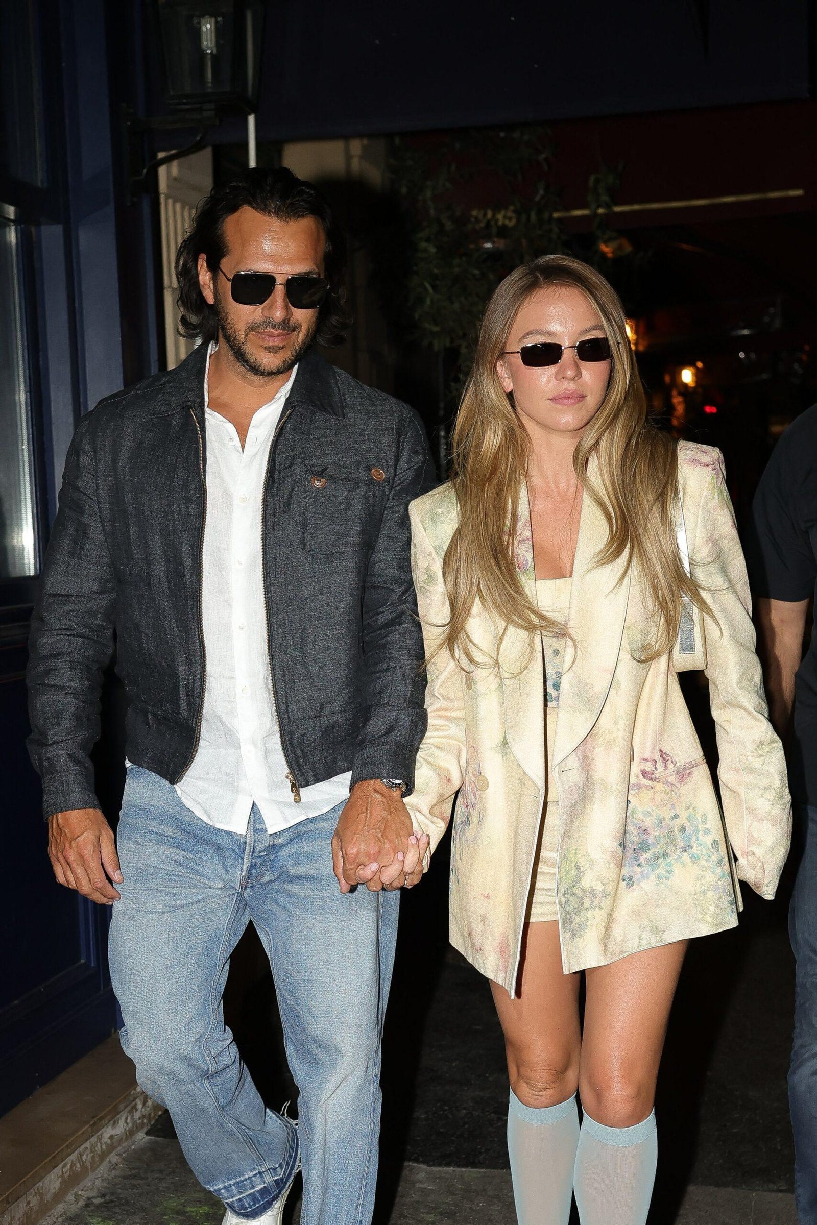 Sydney Suene and Jonathan Davino are on hand after a romantic dinner at an Italian restaurant in Paris