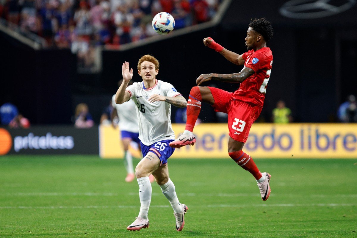 US striker Josh Sargent fights the ball