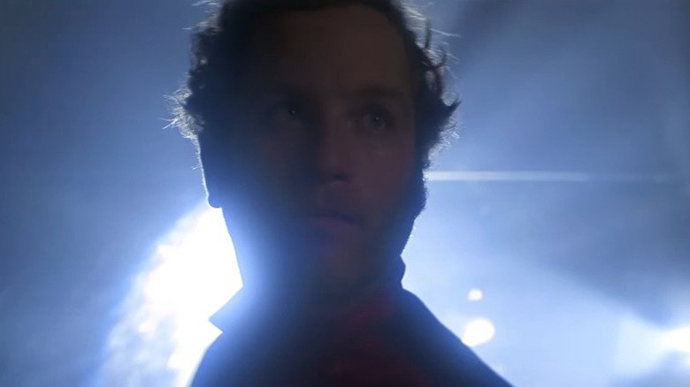 Roy is near standing in front of the mother in close meetings of the third type