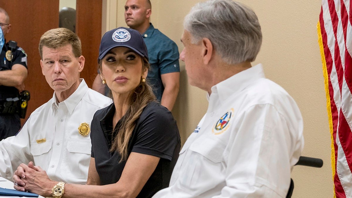 Internal Security Minister Christie Nom and Governor Greg Abbott are discussing the ongoing efforts of the recent floods along the Guadalpe River during a press conference in Ingram, Texas, on Saturday, July 5, 2025, as head of the Emergency Management Department in Texas, Nim Kid, to the left.
