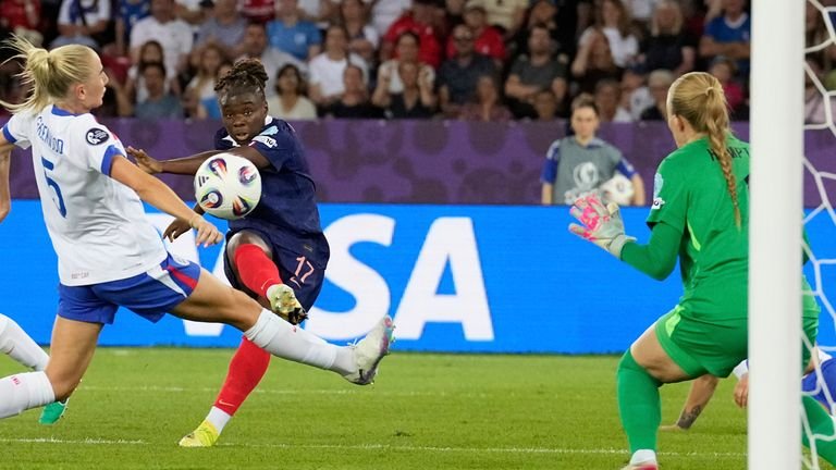 Sandy Baltimore from France scores its second team's goal against England