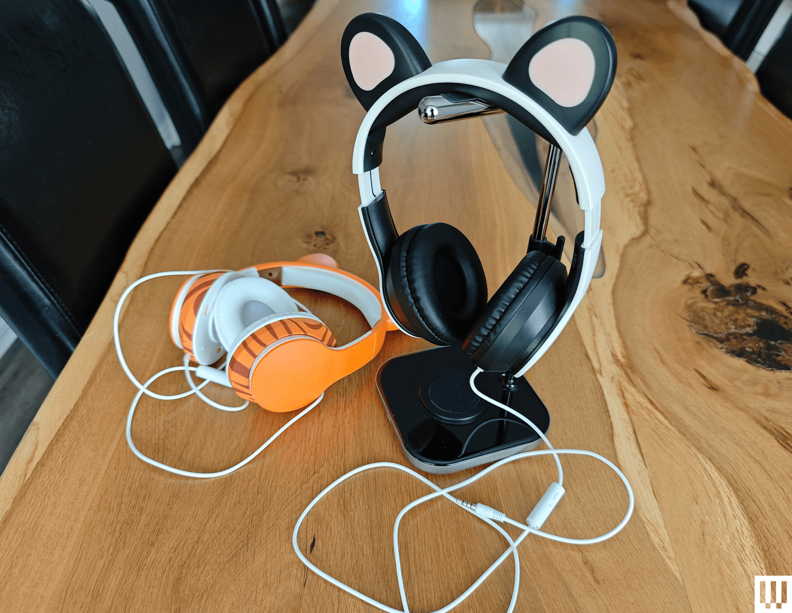 The image may contain electronics and wooden headphones