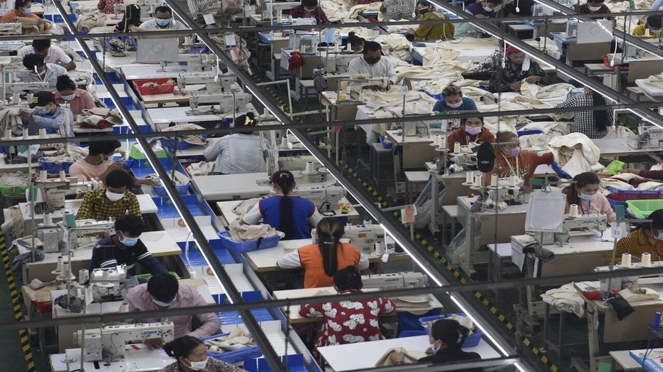 Club workers at the Cambodi Factory