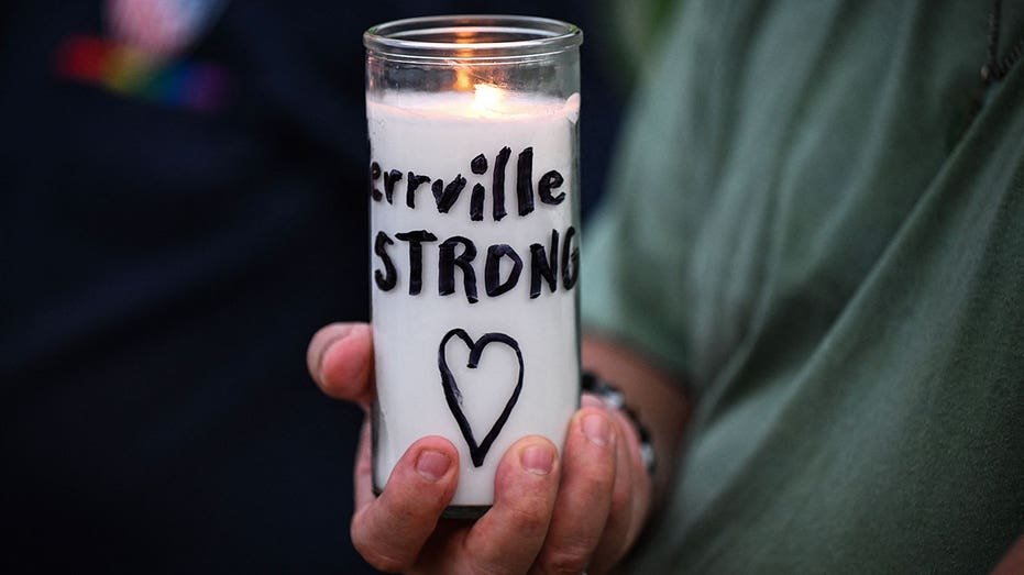 The person holds the candles reading "Kerrville Strong" During the protest of the flood victims during the weekend of the fourth week of July, in Travis Park, in San Antonio, Texas, on July 7, 2025. The number of catastrophic flood deaths in Texas increased to more than 100 on July 7, where rescuers continued their dark search for people who were sweeping them with water. Among the dead were at least 27 girls and consultants who were residing in a summer youth camp on a river when she hit a disaster during the weekend of the fourth week of July. (Photo Ronaldo Schemidt / AFP) (Photo by Ronaldo Schemidt / AFP via Getty Images)