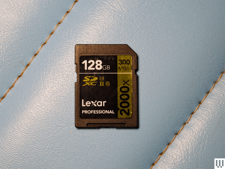 Black notched memory card on blue vinyl