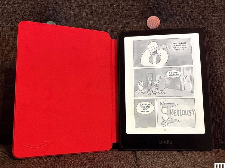Amazon Kindle kids, an e-reader with a red case with the screen showing the page of an e-comic
