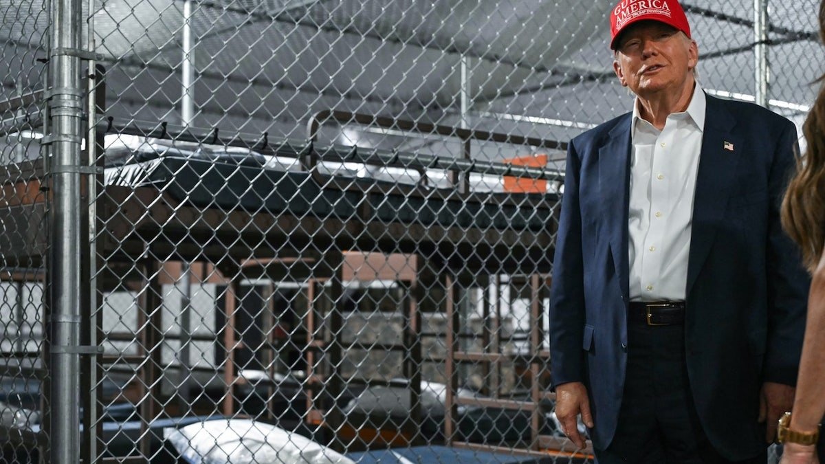 US President Donald Trump wanders at the migrant detention center, called "Cookie crocodile," It is located at the DEDE-Collier Airport in Ochopee, Florida on July 1, 2025. (Andrew Caballero-leynolds / AFP)