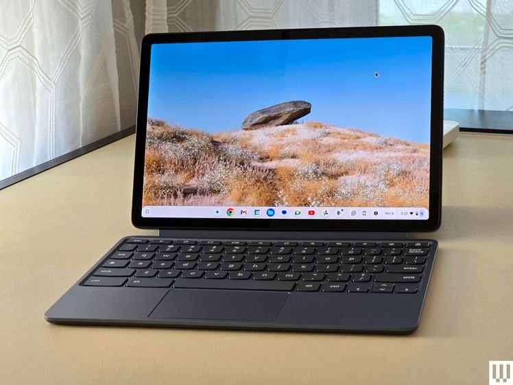 The front display of Diet Lenovo Chromebook, which shows the tablet device attached to the keyboard with the landscape scene on the screen
