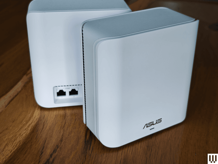 Image may contain: Electronics, Hardware, Router, Adapter, Modem, and Speaker