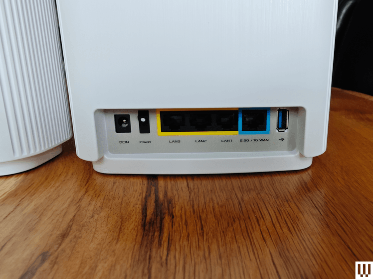 Image may contain: Electronics, Hardware, Router, and Modem