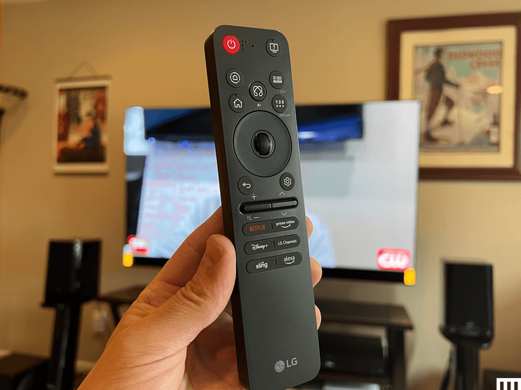 Image may contain: Computer Hardware, Electronics, Hardware, Monitor, Screen, Remote Control, TV, and Person