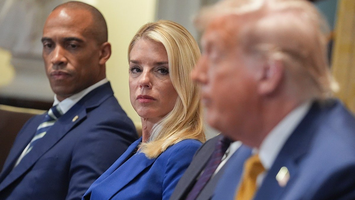 Public Prosecutor Pam Bondi listens to the Cabinet meeting Trump