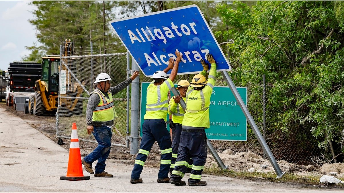 Workers installation of the permanent crocodile mark alcatraz. The facility is located within Florida Evergels, 36 miles to the west from the Central Commercial Zone in Miami, in Coller Province. Florida, on Thursday, July 3, 2025.