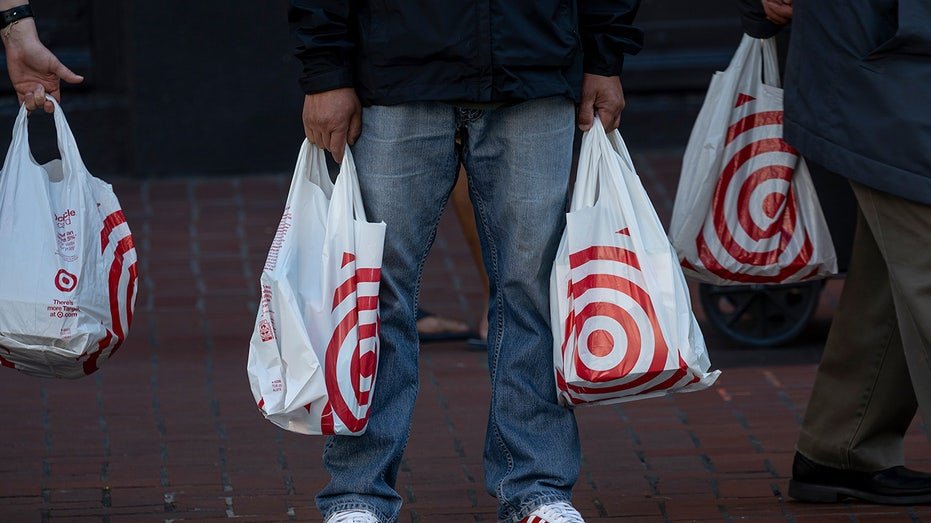 Shoppers carry Target Corp bags in California