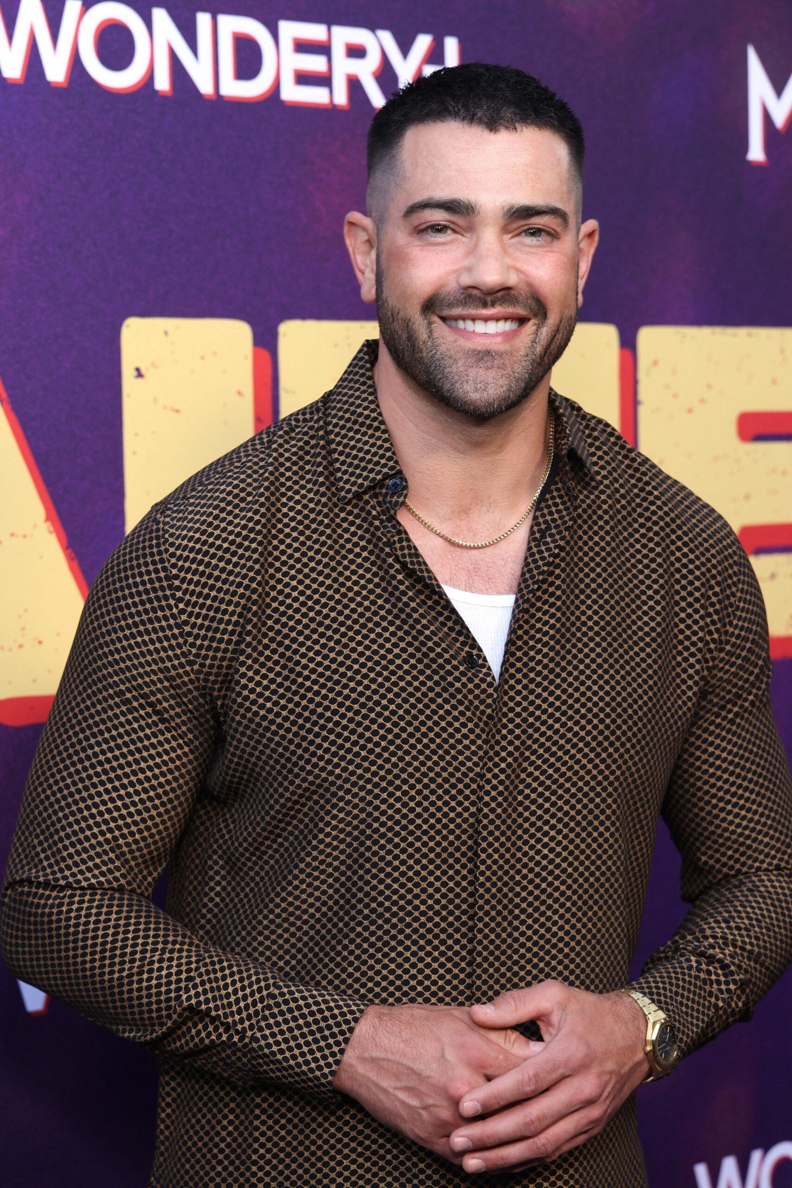 Jesse Metcal thinks on the red carpet.