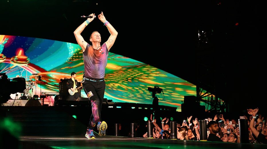 Chris Martin of Coldplay plays on the stage at the OPTUS stadium on November 18, 2023 in Perth, Australia.