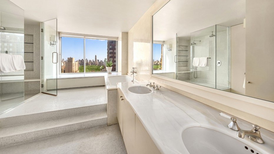 The primary bedroom includes internal bathrooms.