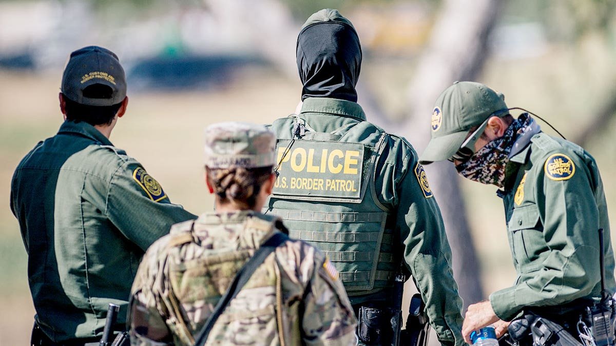 Border agents from behind