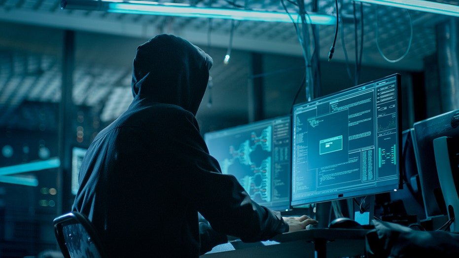 It was photographed from the back to Hooded Hacker storming corporate data servers from underground. The place has a dark atmosphere, multiple shows, cables everywhere.