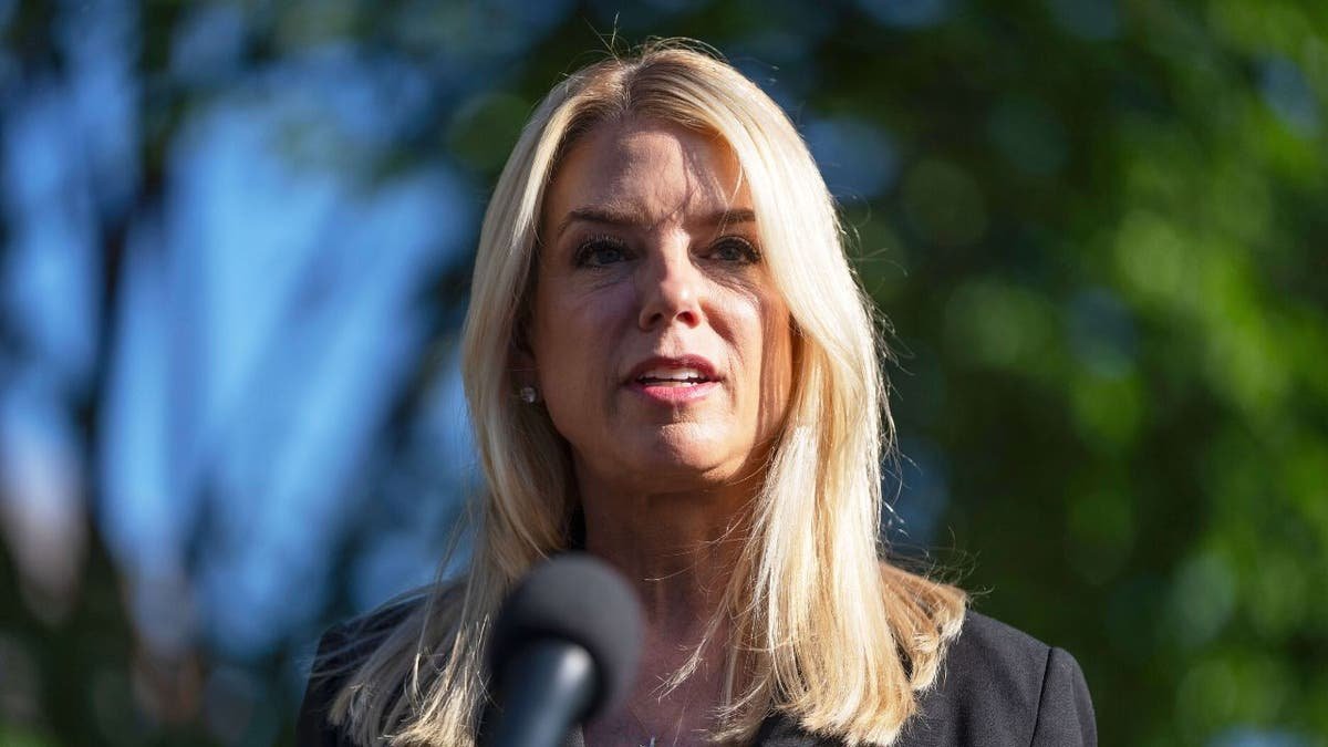 Public Prosecutor Pam Bondi speaks to journalists outside the White House, on Wednesday, May 7, 2025, in Washington. (AP Photo/Mark Schiesfelbein)
