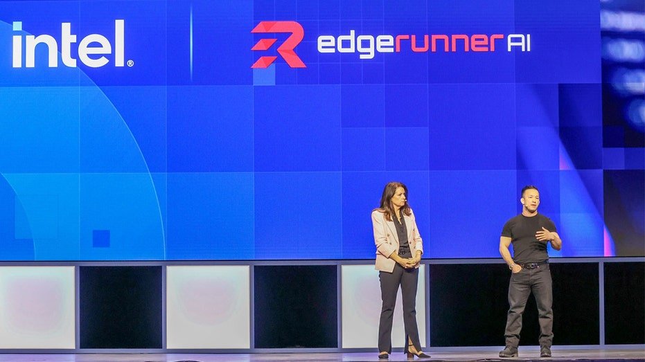 Edgerunner Ai CEO, Tyler Silsman, speaks on the stage with a blue background