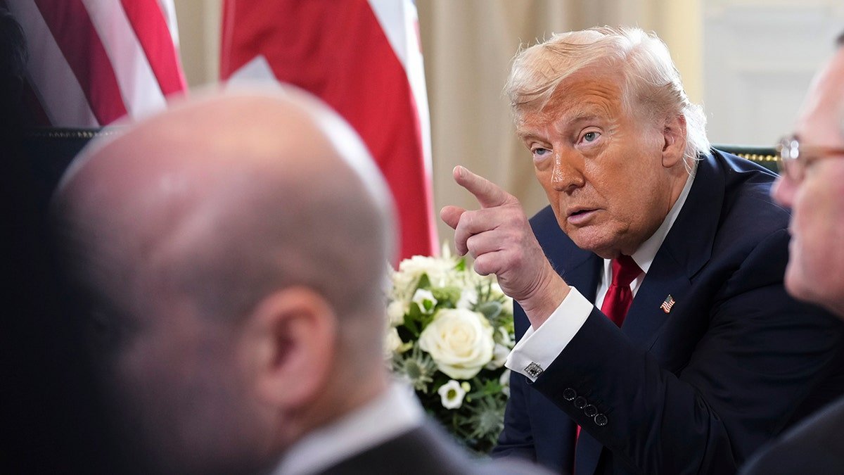 President Donald Trump talks to the media