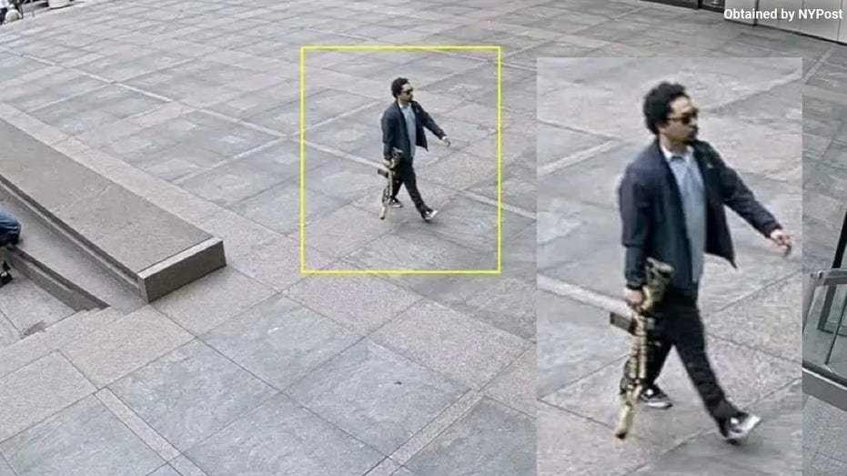 Armed outside the Manhattan building in the city center with a weapon.