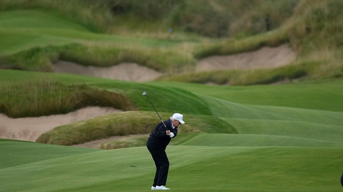 Trump plays at the Golf Stadium in Aberdeen, Scotland