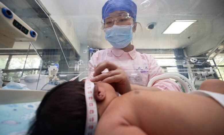 1753805390 China is offering parents 500 annually for each new child.jpg