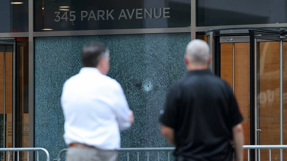 The scene is outside the American Football Association building, where the mass fire occurred in New York City