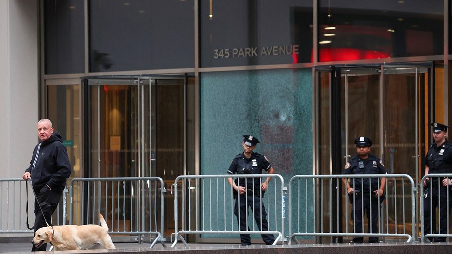 The scene is outside the American Football Association building, where the mass fire occurred in New York City