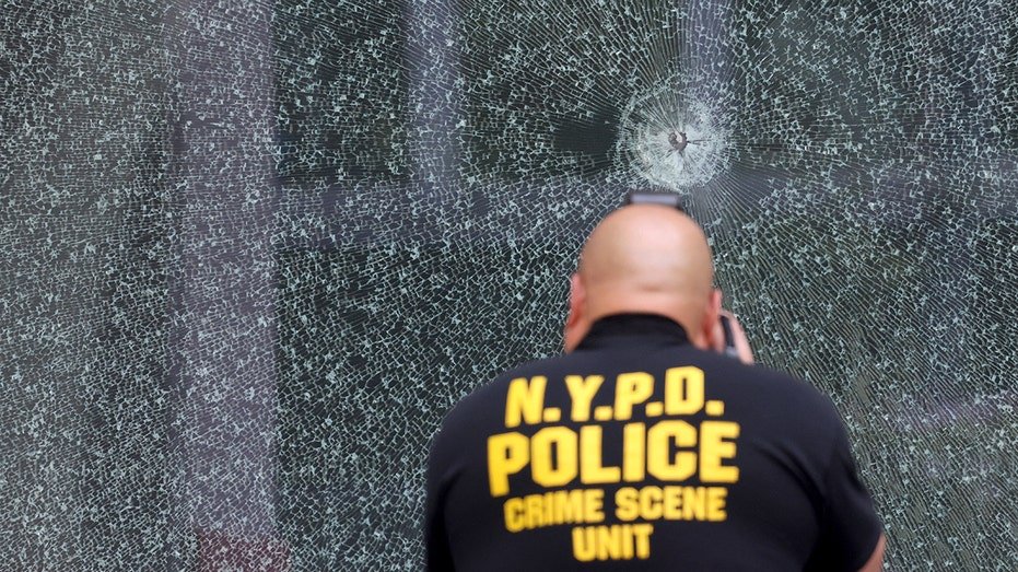 The scene is outside the American Football Association building, where the mass fire occurred in New York City