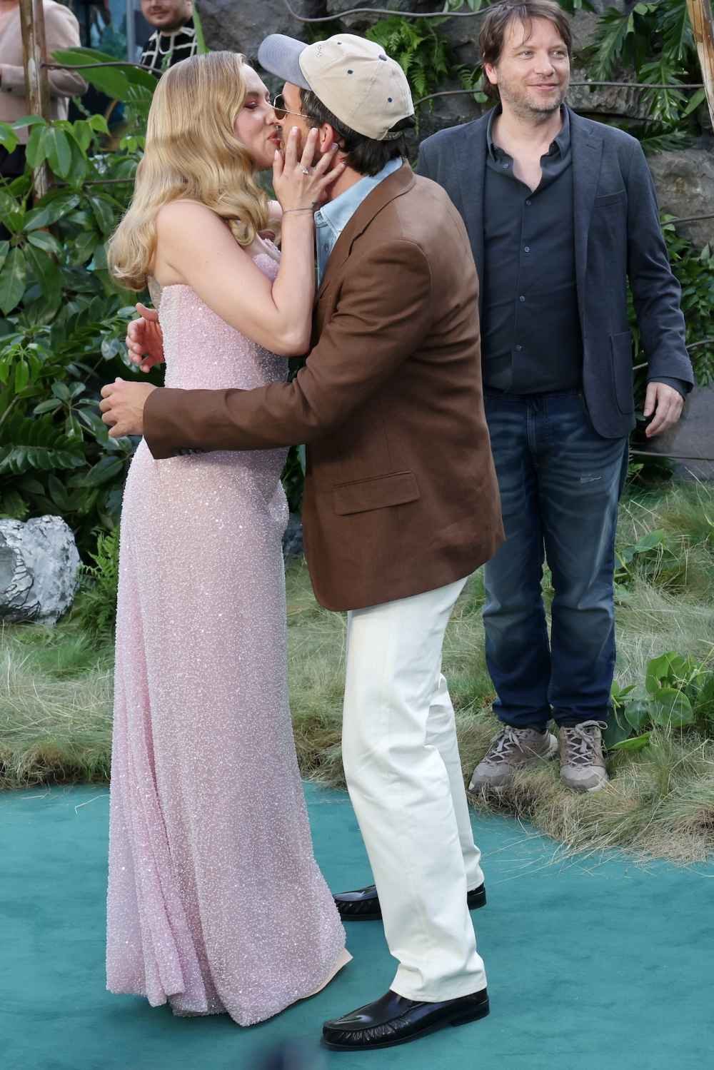 Collin Ghost interacts with Jonathan Billy, accepting his wife, Scarlett Johansson