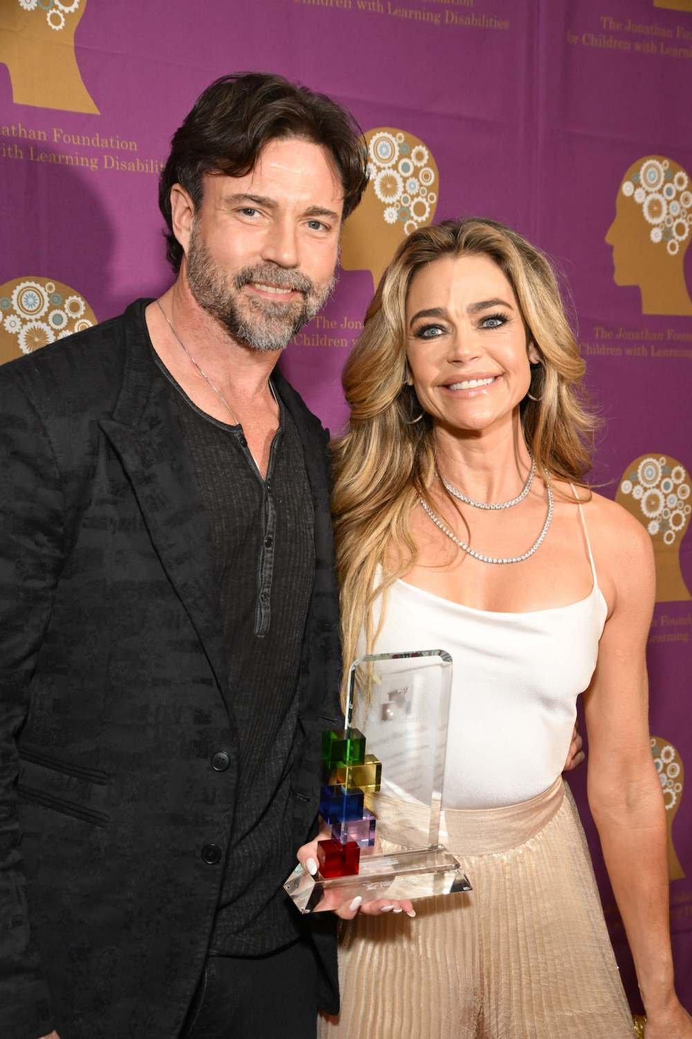 Gettyimages-2215651936 Aron Phypers and Denise Richards Letter of Enter