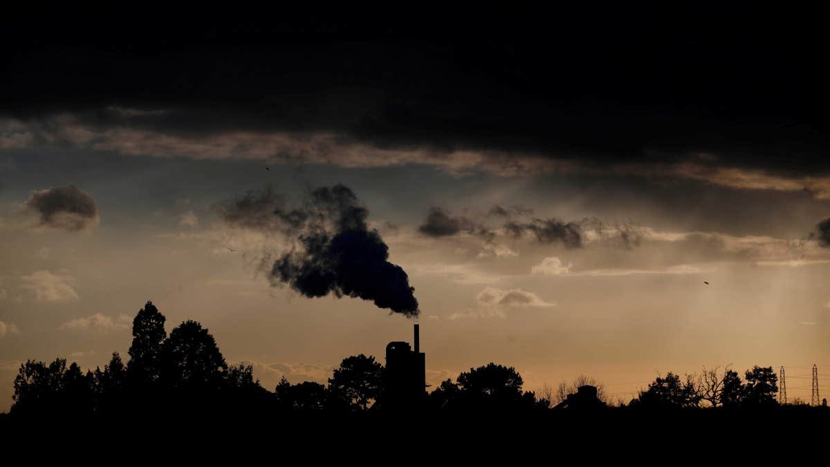 Smoke rises from the factory
