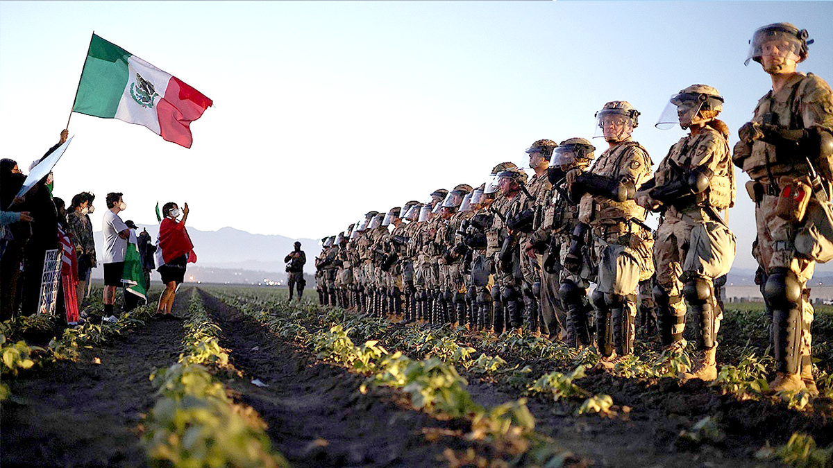 The National Guard forces are prevented from demonstrators from an ice raid on a farm near hashish in California.