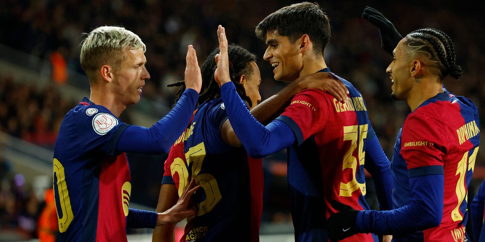 Gul Conde of Barcelona is celebrating their second goal with Gerard Martin, Danny Olmo and her wedding